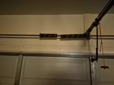 Before — Broken Garage Door Spring Replacement & 17-Point Maintenance