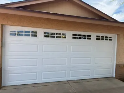 16x7 Sectional Garage Door Installation with Glass Top