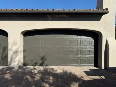 After — Dual Garage Door Installation – 16x8 & 8x8 Steel Doors