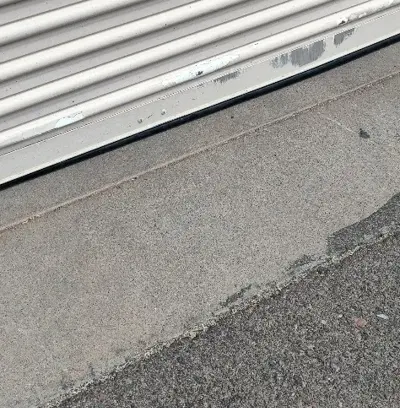 Commercial Coiling Door Installation with Guides and Seals