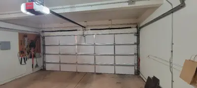 Before — Custom Wood Garage Door Installation & Haul Away