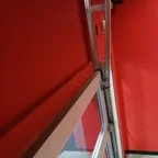 After - Commercial Glass Garage Door Installation for Fitness Facility