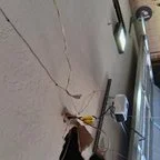 After - 16x7 Garage Door Replacement with New Wi-Fi-Connected Opener