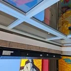 After - Full-View Glass Commercial Overhead Door Installation for Restaurant