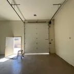 After - New Build Garage Door Installation - Three Clopay Doors & Openers