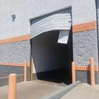 After - Commercial Garage Door Repair: Off-Track Door & Bent Sections