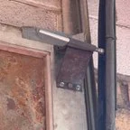 After - Garage Door Roller Repair for Kerry's Car Care Commercial Facility