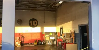 Before — Commercial Garage Door Preventative Maintenance for Multi-Bay Facility