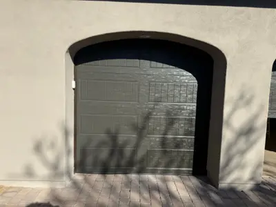 Before — Dual Garage Door Installation – 16x8 & 8x8 Steel Doors
