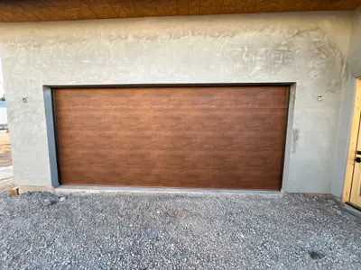 After — 18x8 Insulated Garage Door Installation with Smart Opener