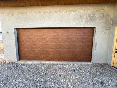 After — 18x8 Insulated Garage Door Installation with Smart Opener