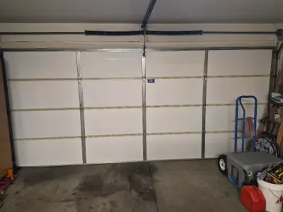 Garage Door Spring Replacement & 17-Point Inspection