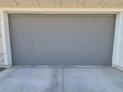 After — Storm-Damaged Bottom Panel Repair for Sectional Garage Door