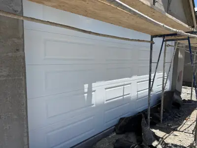 New Sectional Garage Door Installation – Dual Doors with Smart Openers
