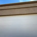 After - 18x7 Garage Door Panel Replacement with Steel Flush Door