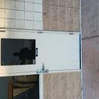 After - Commercial Garage Door Cable Replacement and Door Sweep Installation