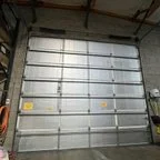 Before - Commercial Garage Door Springs and Rail Replacement for Manufacturing Facility