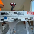 After - Two-Door Garage Door Installation with Modern Steel Panels and Windows