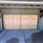 After - Custom Cedar Wood Garage Door Installation for New Build