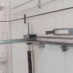 After - Commercial Garage Door Track Repair and Adjustment at Big O Tires