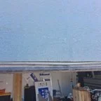 After - Garage Door Bottom Section Realignment and 17-Point Maintenance