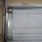 After - Emergency Garage Door Off-Track Repair for Property Management