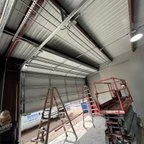After - New Commercial Sectional Garage Doors Installation for Barn