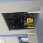 After - Commercial Garage Door Repair for Industrial Facility Vertical Sectional Doors