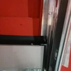 After - Commercial Glass Garage Door Installation for Fitness Facility