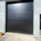 After - New Build Garage Door Installation - Three Clopay Doors & Openers