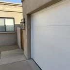 After - 18x7 Garage Door Panel Replacement with Steel Flush Door