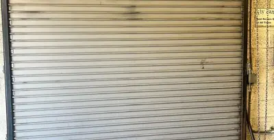 Before — Commercial Roll-Up Door Repair and Maintenance