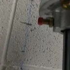 After - Garage Door Repair: Off-Track Door Realignment and Remote Programming