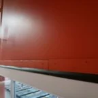 After - Commercial Glass Garage Door Installation for Fitness Facility