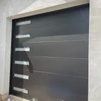 After - New Build Garage Door Installation - Three Clopay Doors & Openers