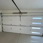 After - Commercial Garage Door Installation: Two Modern Steel Doors for Valwest Construction