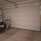 After - Garage Door Bottom Section Realignment and 17-Point Maintenance