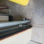 After - Commercial Garage Door Repair for Industrial Facility Vertical Sectional Doors