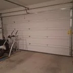 After - Garage Door Bottom Section Realignment and 17-Point Maintenance