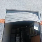 After - Commercial Garage Door Repair: Off-Track Door & Bent Sections
