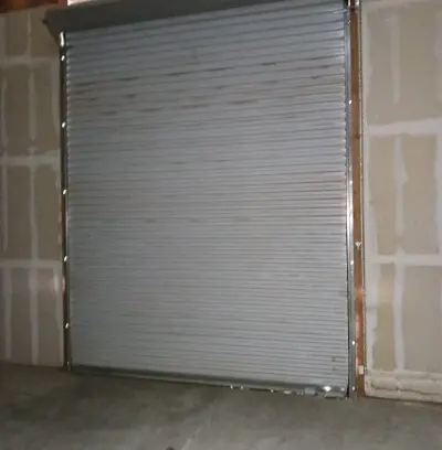 Commercial Garage Door General Service and Hinge Replacement