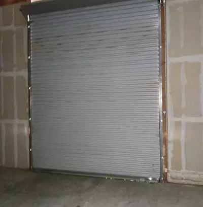 Commercial Garage Door General Service and Hinge Replacement