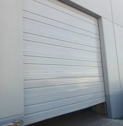 After — Commercial Roll-Up Door Repair after Forklift Impact