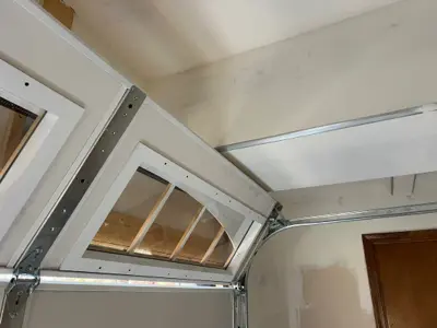 Before — Custom Wood Garage Door Installation - 4 Doors with Smart Opener