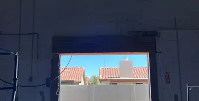 Before — Commercial Sectional Garage Door Installation - Aldi