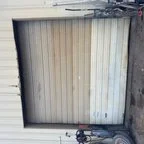 Before - Commercial Sectional Garage Door Replacement for Belmont Properties