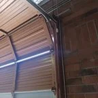 Before - Commercial Sectional Garage Door Replacement for Business Suite