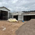 Before - Multiple CHI Raised Panel Garage Door Installation for Global Preservation Construction