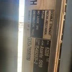 Before - Commercial Overhead Sectional Door Replacement for Auto Service Facility