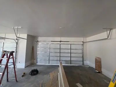 New Construction: Dual Sectional Garage Doors with Smart Openers